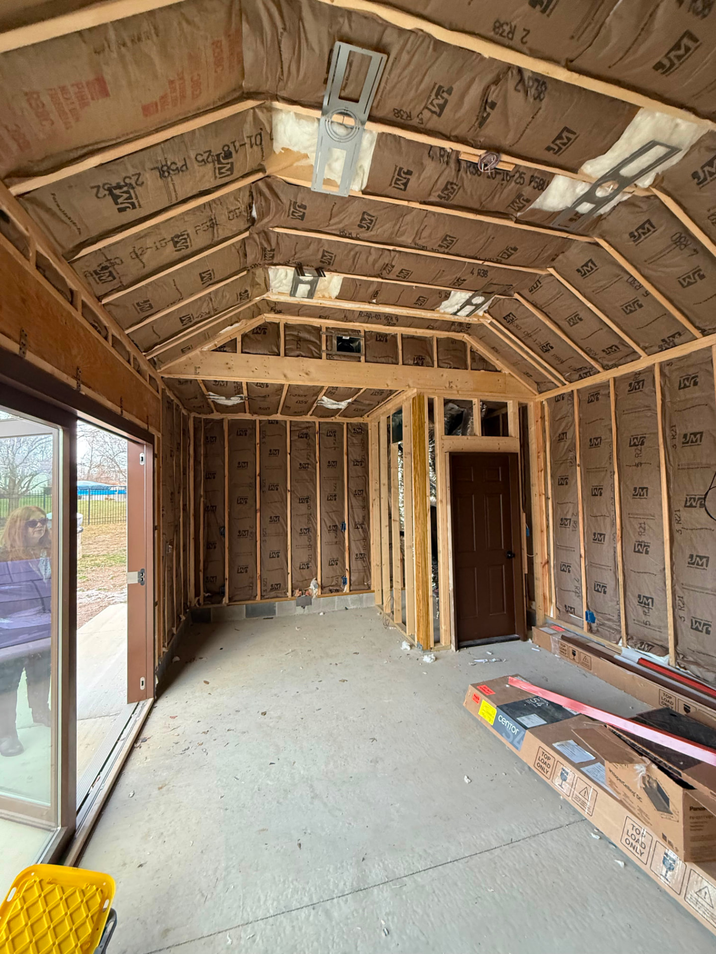 Pool house main room with walls and vaulted ceiling insulated