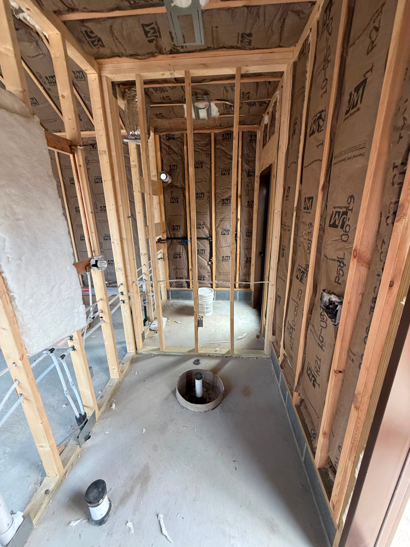 Pool house bathroom area insulated and ready for drywall