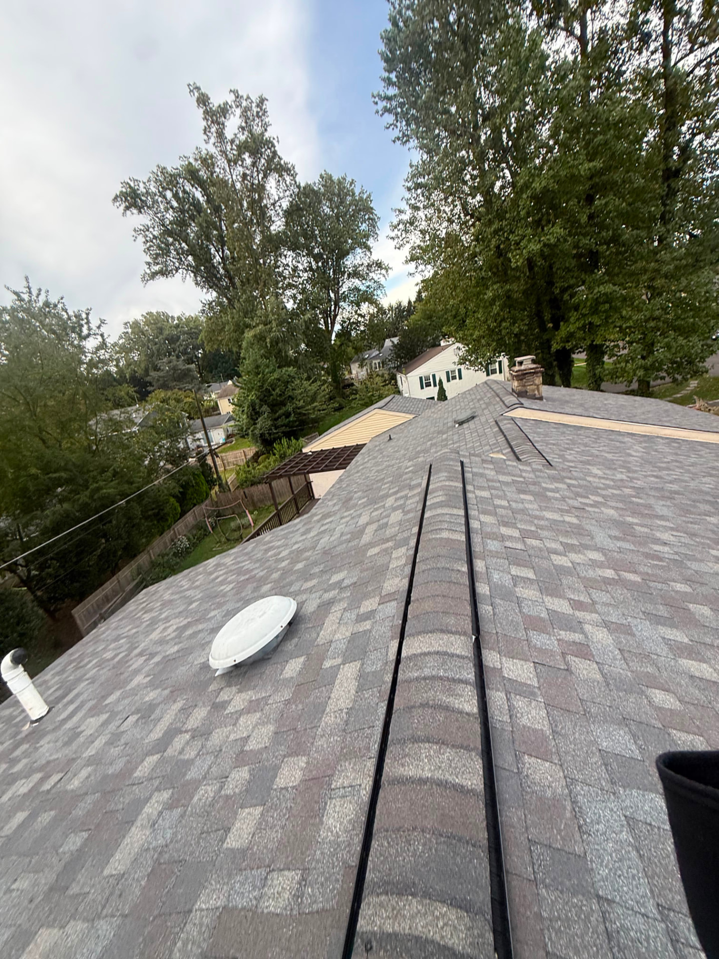New multi-tone shingle roof with ridge cap and box vent